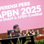 Image Credit Joanito De Saojoao/Beritasatu - Coordinating Minister for the Economy Airlangga Hartarto (left), chatting with Indonesian Minister of Finance Sri Mulyani, on the sidelines of the 2025 Draft State Budget Press Conference at the Directorate General of Taxes head office, Ministry of Finance, Jakarta, Friday, August 16, 2024.