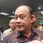 Head of the National Nutrition Agency (BGN) Dadan Hindayana responded to criticism of MBG, at the Ministry of Public Works Office, Jakarta, Saturday (3/22/2025). (Arief/Liputan6)